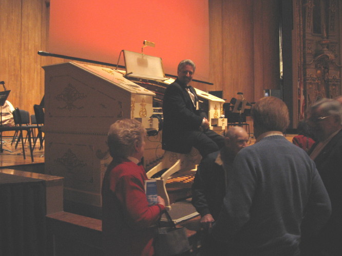 Dennis James greets people after the performance.